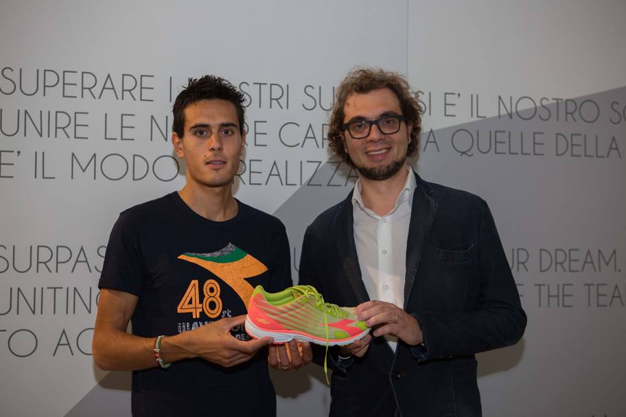 Enrico Moretti Polegato e Daniele Meucci all’inserimento della scarpa di Meucci nel museo Diadora dopo la vittoria degli Europei 2014 (Ottobre 2014)